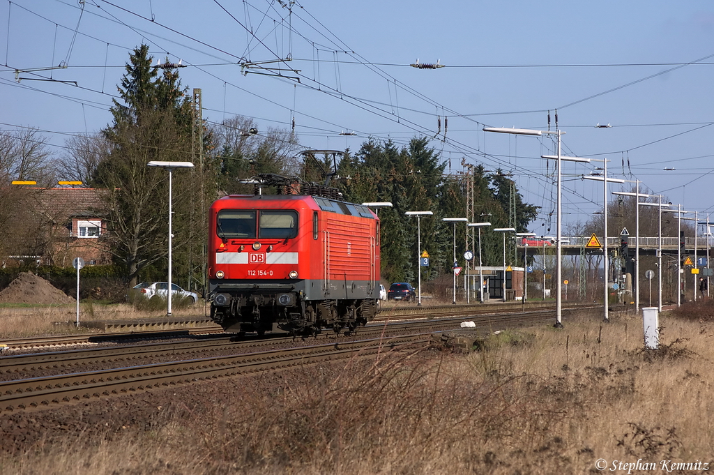 Die Kielerin 112 154-0 als Lz in Suderburg und fuhr in Richtung Celle weiter. 23.03.2012 