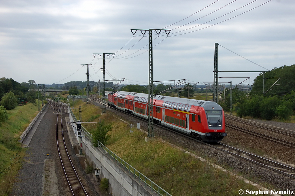 RB29 (RB 27567) von Salzwedel nach Stendal in Stendal Ortsteil Wahrburg und geschoben hatte die 143 926-4. 07.09.2012
