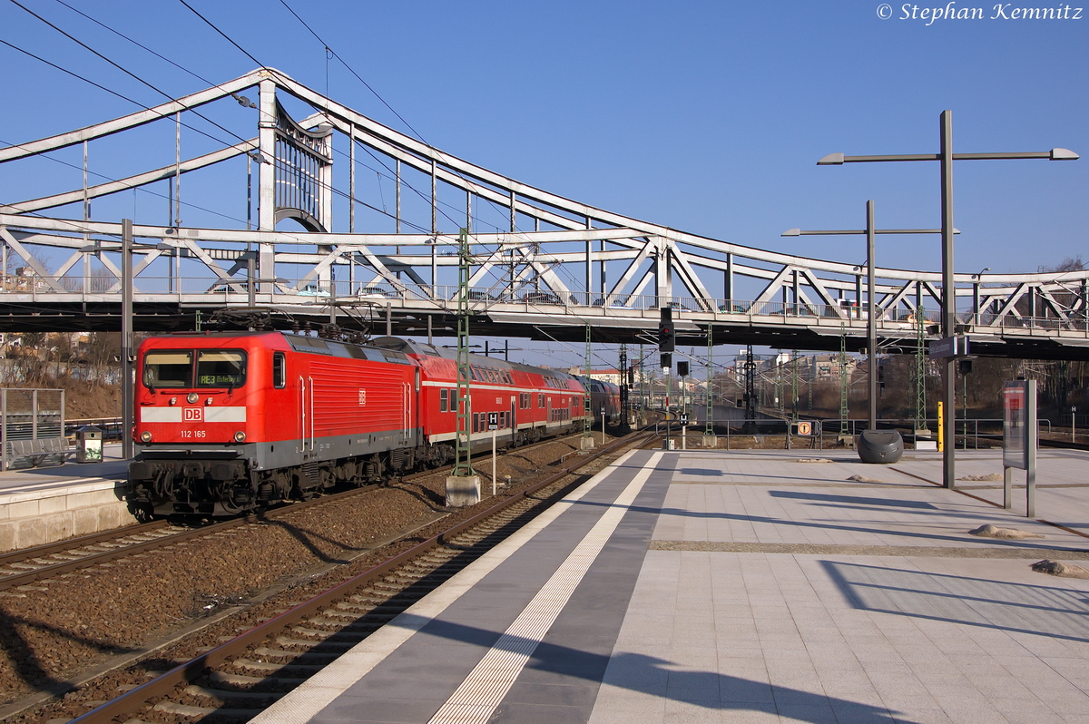 112 165 mit dem RE3 (RE 18351) von Schwedt(Oder) nach Elsterwerda, bei der Einfahrt in Berlin Gesundbrunnen. 25.02.2014