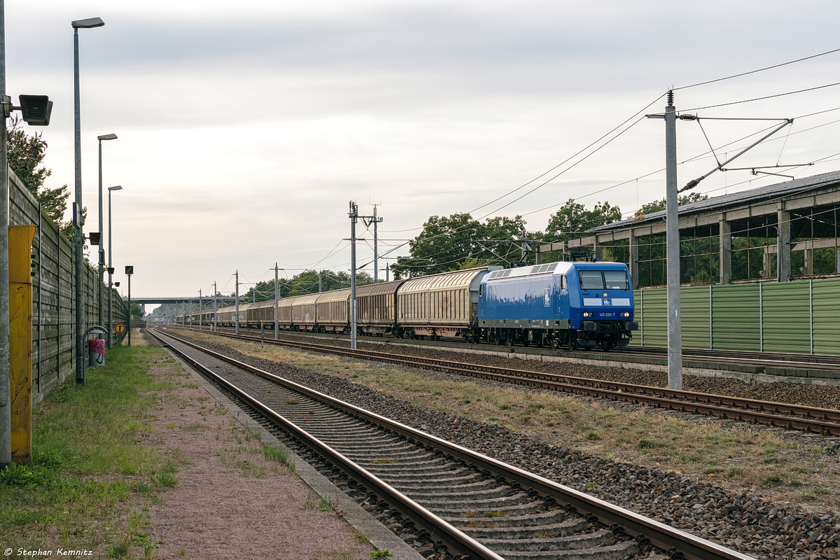 145 030-7 PRESS (145 085-7) mit einem H-Wagen Ganzzug in Großwudicke und fuhr weiter in Richtung Rathenow. 20.09.2018