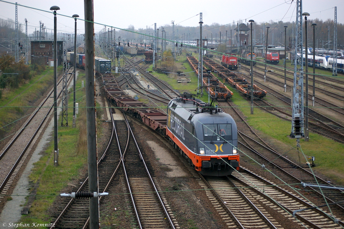 242.517  Fitzgerald  (182 517-3) Hector Rail AB für LOCON Benelux B.V. mit einem Containerzug, bei der Durchfahrt durch den Wustermarker Rangierbahnhof und fuhr weiter in Richtung Priort. 15.11.2014