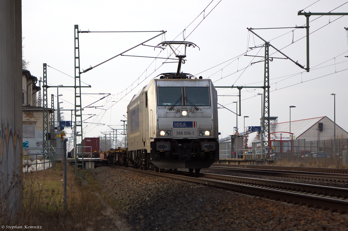 386 006-1 METRANS Rail s.r.o. mit einem Containerzug in Friesack(Mark) und fuhr weiter in Richtung Nauen. 06.03.2015