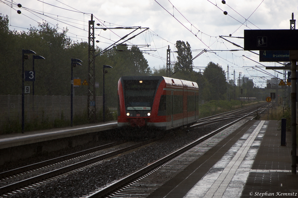 646 011-6 als RB12 (RB 28776) von Berlin-Lichtenberg nach Templin Stadt, bei der Einfahrt im verregneten Berlin-Hohenschönhausen. 24.06.2014