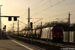 185 604-6 Alpha Trains NV/SA für HGK - Häfen und Güterverkehr Köln AG [2062] mit einem Kesselzug  Umweltgefährdender Stoff, flüssig  in Rathenow in Richtung Wustermark