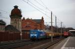 145 030-7 PRESS (145 085-7) mit einem Holzzug in Rathenow in Richtung Stendal unterwegs. 22.02.2012