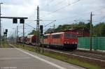 155 099-5 DB Schenker Rail Deutschland AG mit der Wagenlok 155 107-6 und einem gemischtem Gterzug in Rathenow und fuhr in Richtung Wustermark weiter. 07.06.2012