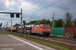 152 042-8 DB Schenker Rail Deutschland AG mit einem gemischtem Gterzug in Rathenow und fuhr in Richtung Wustermark weiter.