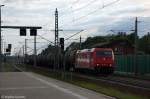 185 588-1 HGK - Häfen und Güterverkehr Köln AG [HGK 2056] mit einem Kesselzug  Umweltgefährdender Stoff, flüssig  in Rathenow und fuhr in Richtung Wustermark weiter. Am Zugende hing noch die 421 397-1 (kalt). 17.06.2012