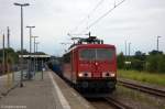155 251-2 DB Schenker Rail Deutschland AG mit einem gemischtem Gterzug, bei der Einfahrt in Rathenow.