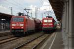 Die 152 105-3 DB Schenker Rail Deutschland AG mit einem Tads Ganzzug und die 112 170 mit dem RE20 (RE 17639) von Uelzen nach Halle(Saale)Hbf, trafen sich in Stendal. 01.07.2014