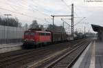140 716-2 DB Schenker Rail Deutschland AG mit einem gemischtem Güterzug, bei der Durchfahrt in Winsen(Luhe) und fuhr in Richtung Maschen weiter. 04.02.2014