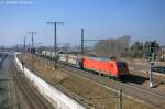 145 047-7 DB Schenker Rail Deutschland AG mit einem gemischtem Gterzug in Stendal(Wahrburg) und fuhr in Richtung Rathenow weiter. 06.03.2013
