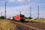 145 002-2 DB Schenker Rail Deutschland AG mit einem Containerzug in Satzkorn und fuhr in Richtung Golm weiter. 01.08.2013