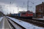 155 038-3 DB Schenker Rail Deutschland AG mit einem Containerzug in Priort. Der Zug wurde in Priort abgestellt. 21.02.2013