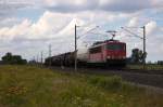 155 013-6 DB Schenker Rail Deutschland AG mit einem gemischtem Gterzug in Vietznitz und fuhr in Richtung Nauen weiter. 31.07.2013