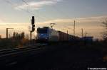 185 548-5 ITL Eisenbahn GmbH mit einem Containerzug in Stendal(Wahrburg) und fuhr in Richtung Gterbahnhof weiter. 13.11.2012