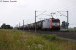 185-CL 003 (185 503-0) Captrain Deutschland GmbH fr ITL - Eisenbahngesellschaft mbH mit einem Kesselzug  Umweltgefhrdender Stoff, flssig  in Vietznitz und fuhr in Richtung Nauen weiter.
