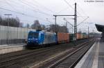 185 511-3 Alpha Trains für METRANS Rail s.r.o. mit einem Containerzug, bei der Durchfahrt in Winsen(Luhe) und fuhr in Richtung Maschen weiter. 04.02.2014