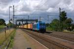 185 511-3 Alpha Trains für METRANS Rail s.r.o. mit einem Containerzug in Niederndodeleben und fuhr in Richtung Magdeburg weiter. 12.08.2014