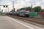 185 555-0 MRCE Dispolok GmbH für CTL Logistics GmbH mit einem Kesselzug, bei der Durchfahrt in Rathenow und fuhr weiter in Richtung Wustermark. 28.07.2015