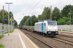 186 433-9 Railpool GmbH für METRANS Rail s.r.o. mit einem Containerzug in Bienenbüttel und fuhr weiter in Richtung Uelzen. 04.09.2015