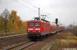 112 108 mit dem RE4 (RE 37328) von Ludwigsfelde nach Rathenow, bei der Einfahrt in Berlin Jungfernheide. 09.11.2012