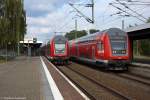 RE1 (RE 18126) von Eisenhüttenstadt nach Magdeburg Hbf, bei der Ausfahrt aus dem Brandenburger Hbf und geschoben hatte die 182 003-4. Zur gleichen Zeit stand auf Gleis 1 der RE1 (RE 18191) nach Frankfurt(Oder). 25.08.2014