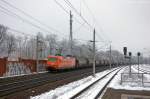 145-CL 002 (145 082-4) ArcelorMittal Eisenhttenstadt Transport GmbH mit dem Staubpendel von Ziltendorf nach Lnen in Rathenow. 10.02.2013