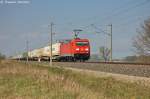 185 223-5 DB Schenker Rail Deutschland AG mit dem KLV  DB SCHENKERhangartner  in Vietznitz und fuhr in Richtung Nauen weiter. 26.04.2013