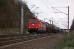 185 587-3 CBRail für Häfen und Güterverkehr Köln AG [HGK 2055] mit einem Kesselzug  Dieselkraftstoff oder Gasöl oder Heizöl (leicht)  bei Nennhausen und fuhr in Richtung Rathenow weiter. 12.04.2012