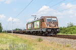 187 537-6 HSL Logistik GmbH mit einem Schienen Transportzug in Nennhausen und fuhr weiter in Richtung Wustermark.