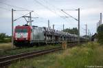 185 598-0 ITL Eisenbahn GmbH mit einem VW Autotransportzug in Demker und fuhr in Richtung Magdeburg weiter.