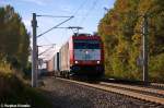 185 649-1 akiem für ITL Eisenbahn GmbH mit einem Containerzug bei Nennhausen und fuhr in Richtung Wustermark weiter.