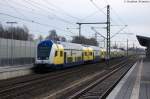Metronom Eisenbahngesellschaft mbH/321589/in-winsenluhe-hatte-einfahrt-der-metronom In Winsen(Luhe) hatte Einfahrt der metronom (ME 81622) von Lüneburg nach Hamburg-Harburg und geschoben hatte die 146 512-9. 04.02.2014 