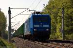 145 030-7 PRESS (145 085-7) mit leeren Holzzug bei Nennhausen und fuhr in Richtung Wustermark weiter. 01.05.2012
