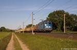 140 038-0 PRESS (140 851-7) mit einem Holzzug bei Rathenow und fuhr nach Stendal weiter. 05.06.2013
