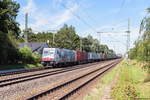 METRANS Rail s.r.o./707589/386-020-2-metrans-rail-sro-mit 386 020-2 METRANS Rail s.r.o. mit einem Containerzug in Friesack und fuhr weiter in Richtung Nauen. 01.08.2020
