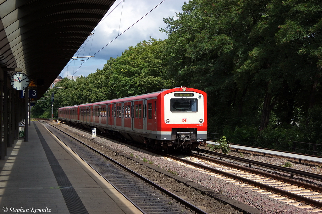 472 029/529 & 472 056/556 S-Bahn Hamburg als S 21 von Hamburg Elbgaustrasse nach Hamburg-Bergedorf, bei der Einfahrt in Hamburg Dammtor. 21.07.2012 