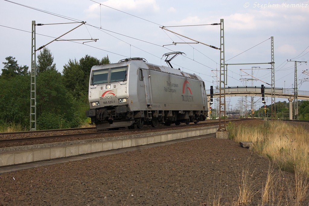185 531-1  Renate  TXL - TX Logistik AG fr SETG - Salzburger Eisenbahn TransportLogistik GmbH kam als Lz durch Stendal(Wahrburg) gefahren und war auf dem Weg nach Borstel um dort einen leeren Hackschnitzelzug zu holen. 15.08.2013
