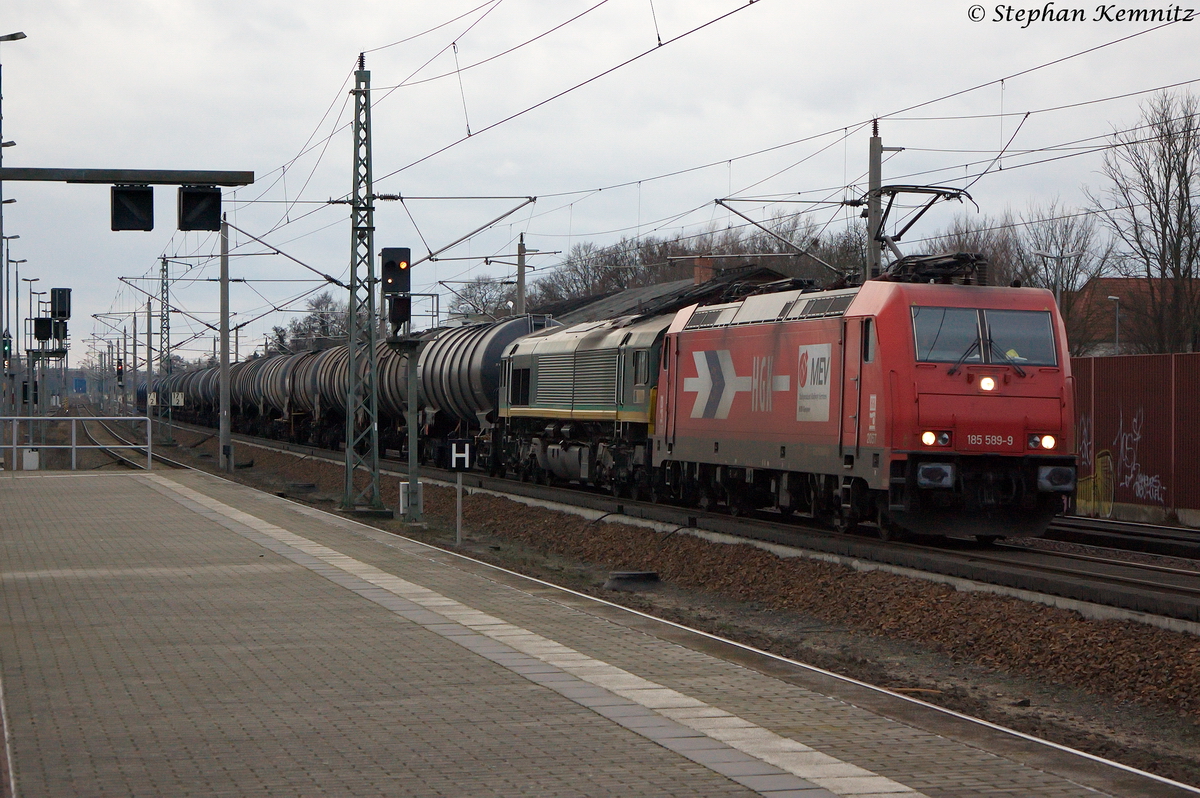 185 589-9 Macquarie Europesold to Rail für RheinCargo GmbH mit der Wagenlok DE 687 (266 005-8) und einem Kesselzug  Benzin oder Ottokraftstoffe  in Rathenow und fuhr in Richtung Wustermark weiter. 09.01.2014