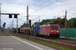 rathenow/202631/185-281-3-db-schenker-rail-deutschland 185 281-3 DB Schenker Rail Deutschland AG mit einem gemischtem Güterzug in Rathenow und fuhr in Richtung Wustermark weiter. 14.06.2012