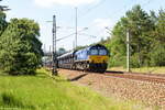 29004 (266 027-2) Heavy Haul Power International GmbH mit einem Kieszug bei Friesack und fuhr weiter in Richtung Nauen.