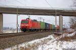 145 031-1 DB Schenker Rail Deutschland AG mit einem Containerzug, bei Nennhausen und fuhr in Richtung Rathenow weiter. 13.01.2013