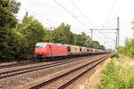 145 092-3 HSL Logistik GmbH mit einem Getreidezug in Friesack und fuhr weiter in Richtung Nauen.