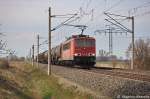 155 201-7 DB Schenker Rail Deutschland AG mit einem gemischtem Gterzug aus Wittenberge, bei der Durchfahrt in Vietznitz und fuhr in Richtung Nauen weiter. 18.04.2013