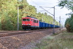 155 056-5 DB Cargo mit dem Kokszug GM 98368 bei Friesack in Richtung Wittenberge.