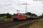 185 079-1 DB Schenker Rail Deutschland AG mit einem Kesselzug  Benzin oder Ottokraftstoffe  in Satzkorn und fuhr in Richtung Priort weiter.