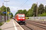 185 011-4 DB Schenker Rail Deutschland AG mit einem Containerzug in Bienenbüttel und fuhr weiter in Richtung Uelzen.