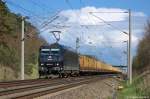 185 547-7 MRCE Dispolok GmbH fr PRESS mit einem Holzzug bei Nennhausen und fuhr in Richtung Rathenow weiter. 21.04.2012