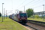 185 513-9 Alpha Trains für Emons Bahntransporte GmbH mit einem kurzem Containerzug, bei der Durchfahrt in Leuna Werke Süd und fuhr weiter in Richtung Merseburg.